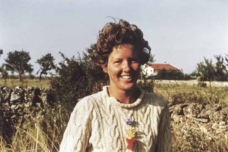 Art and the Environment: Sally Arnold — Fabulous Fabsters, Young woman with landscape of Southern Italy behind her.